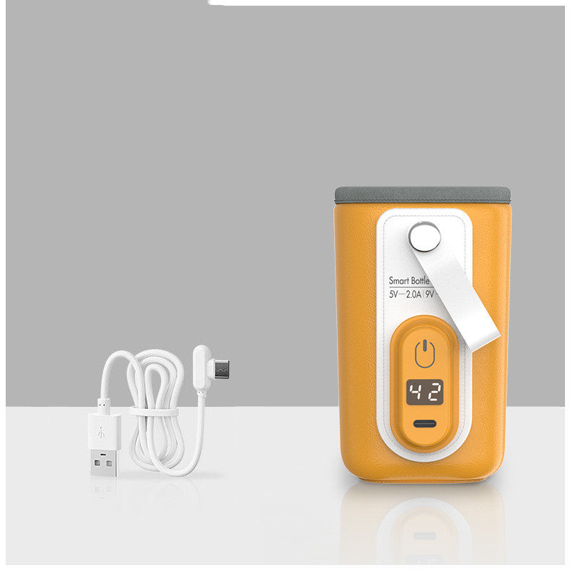 Yellow bottle warmer sleeve shown with the USB charging cable included in the box