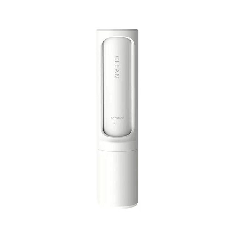 White reusable pet hair remover brush shown with the clean-and-remove sliding mechanism
