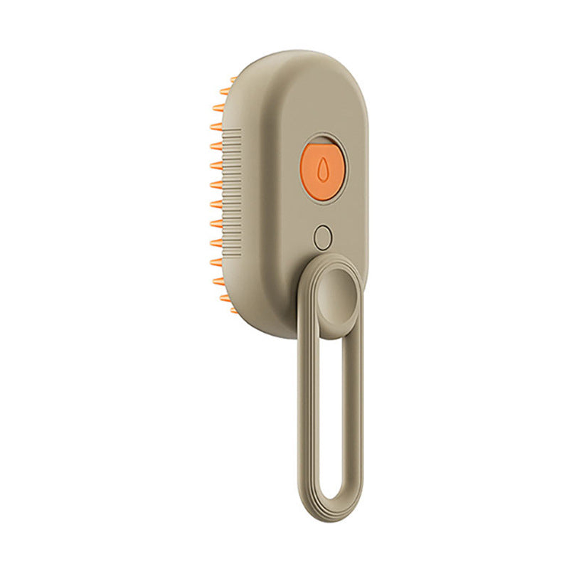 Milk coffee steam pet grooming brush with orange silicone bristles and steam button, side view