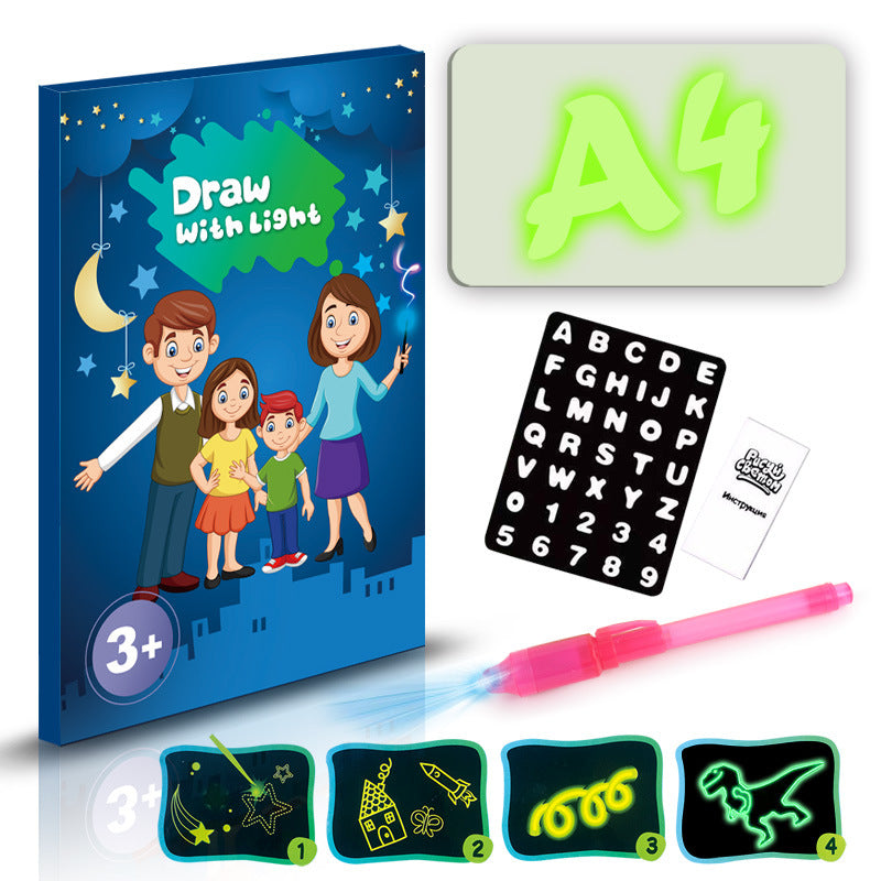 Child using magic light-up drawing board in a dimly lit room