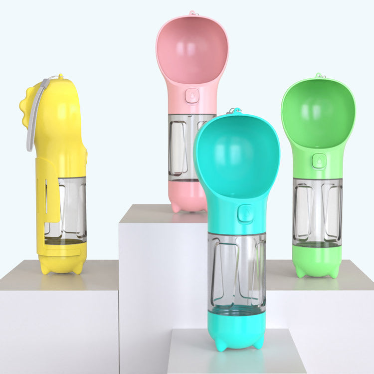 Dog drinking water from portable travel bottle with press-to-flow lid