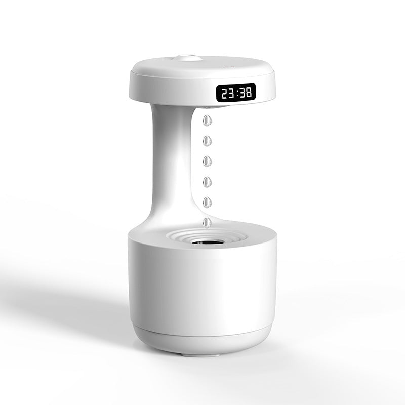 Anti-gravity humidifier with an LED clock display showing 23:38 and a column of water droplets, on a plain white background