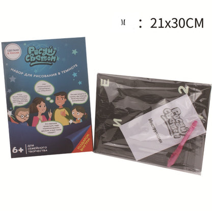 Close-up of the glow drawing board flashlight pen
