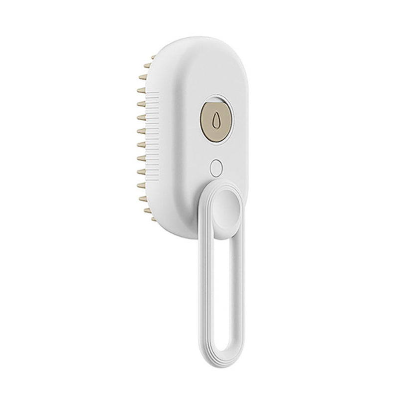 Hand holding a 3-in-1 electric steam pet grooming brush