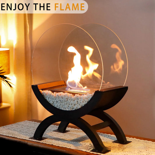 Desktop alcohol fireplace lamp with a lit flame styled on a cozy indoor mantle