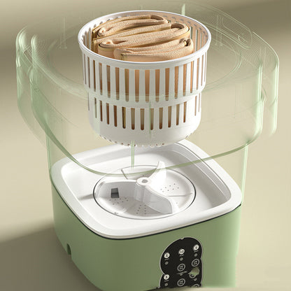 Cutaway view of the green washing machine showing the drain basket lifted above the spin plate, with the 1, 5 and 10 minute timer panel below