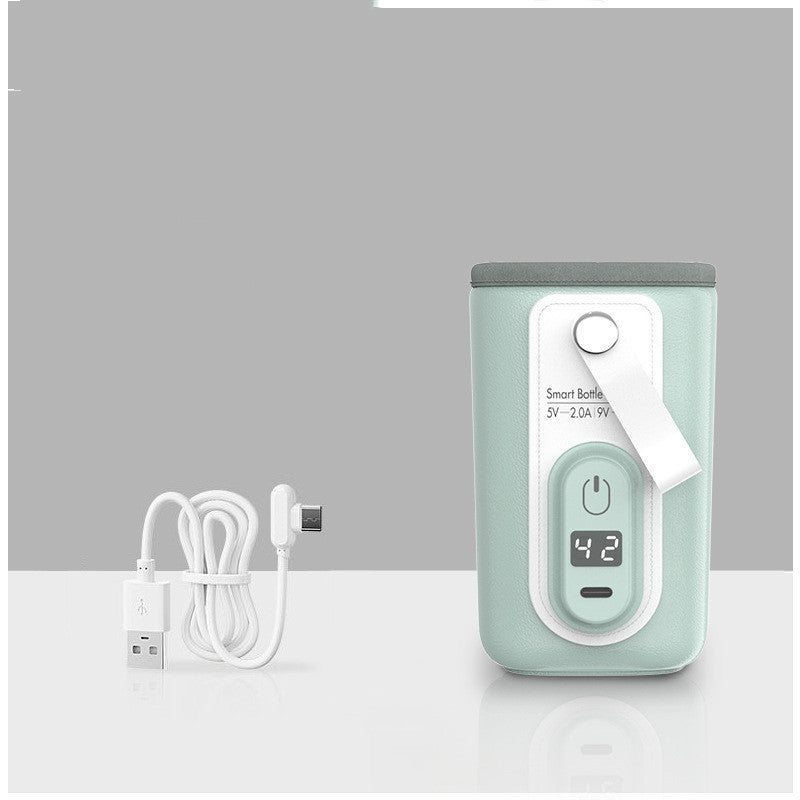 Green bottle warmer sleeve shown with the USB charging cable included in the box