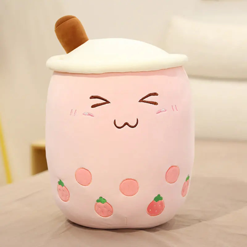 Close-up of the bubble tea plush pillow embroidered straw and face detail