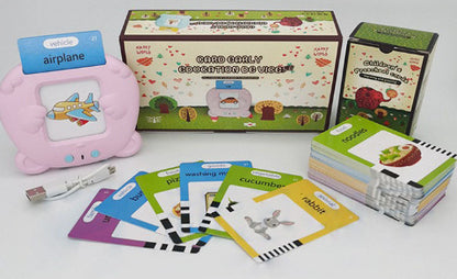 Everything included in the box: pink learning machine, USB charging cable, retail box and the full deck of double-sided word cards
