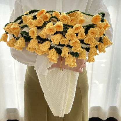 Floral woven cotton blanket folded into a golden yellow flower bouquet design