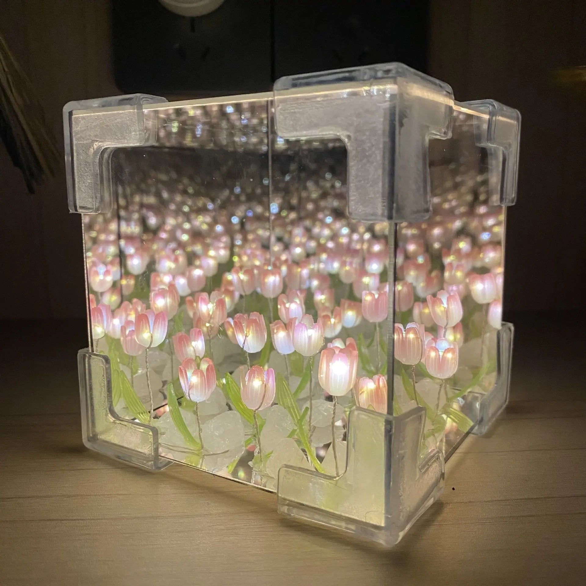 DIY tulip mirror night light kit assembled into a glowing pink cube lamp