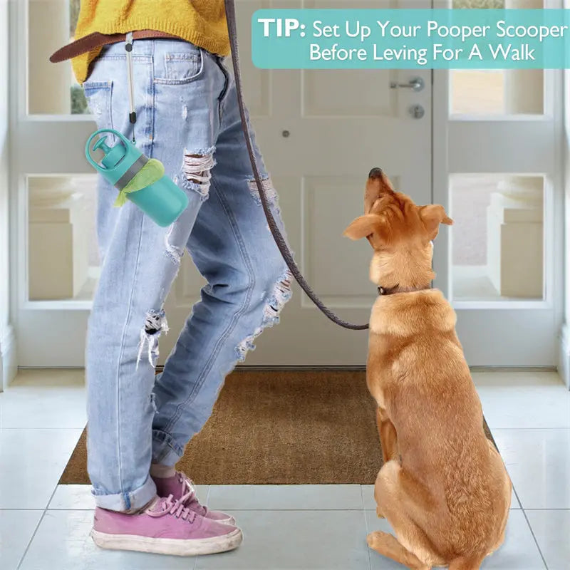 Woman using the dog pooper scooper on a walk with her dog near a door