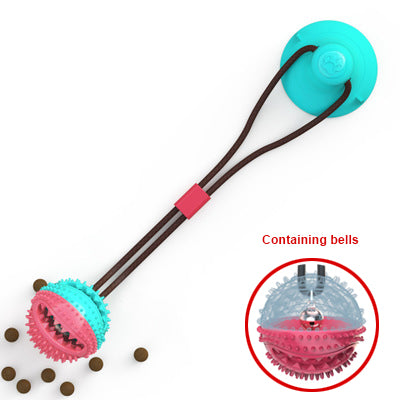 Silicone suction cup dog tug toy in red with containing bells feature detail