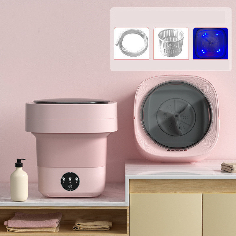 Pink foldable washing machine with inset images of the included drain pipe, drain basket and blue light drum