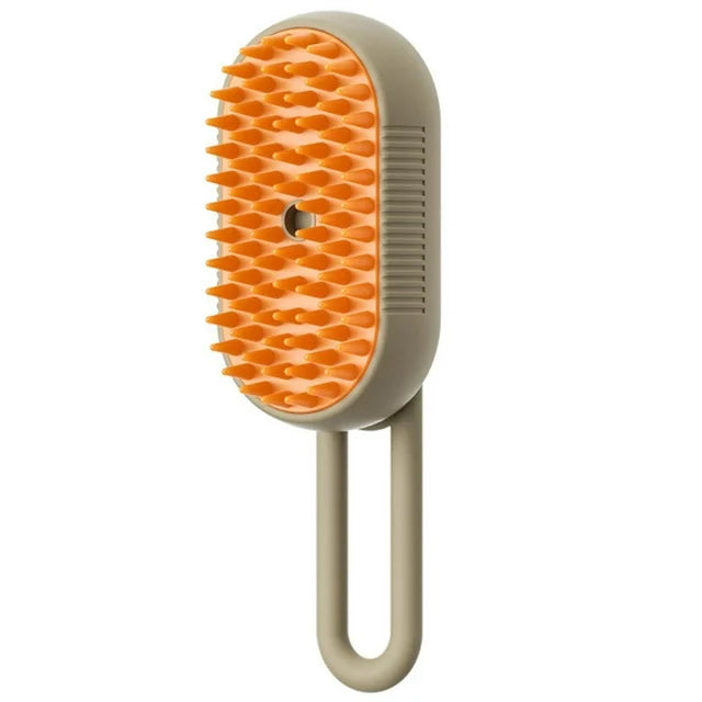 Close-up of the power button on an electric steam pet grooming brush