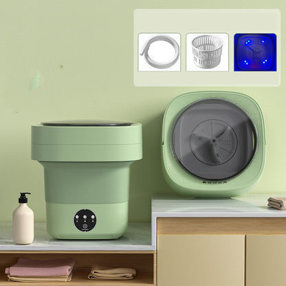 Green foldable washing machine with inset images of the included drain pipe, drain basket and blue light drum