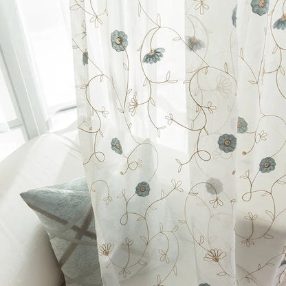 Close-up of the garden embroidered pattern on the sheer curtain fabric