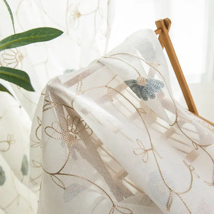 Garden embroidered sheer curtain showing linen and polyester fabric texture
