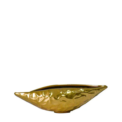 Close-up of the gold-plated ceramic vase in geode silhouette shape