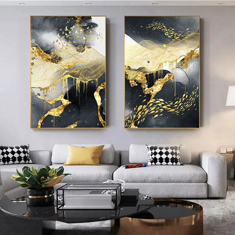 Gold, black, and white two-panel canvas wall art displayed in a color-coordinated living room