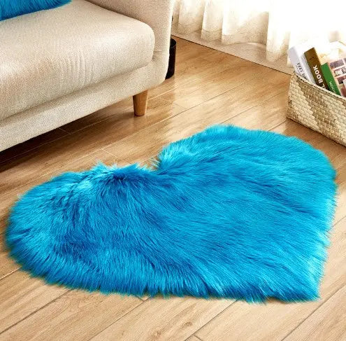 Close-up of the soft plush texture on the heart-shaped fluffy rug