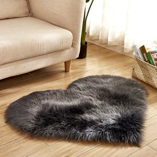 Heart-shaped fluffy rug styled in a full living room scene