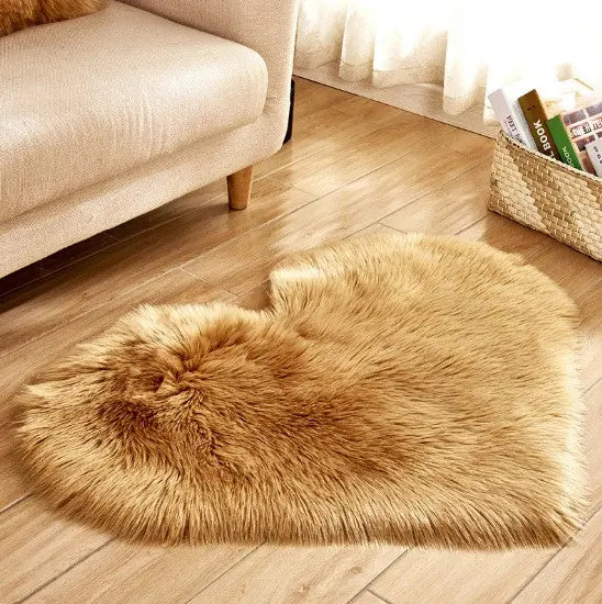 Heart-shaped fluffy rug underside showing non-slip backing