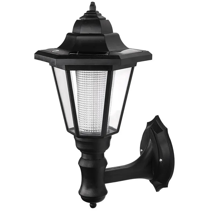 Solar hexagonal outdoor wall light shown in daylight to display the design