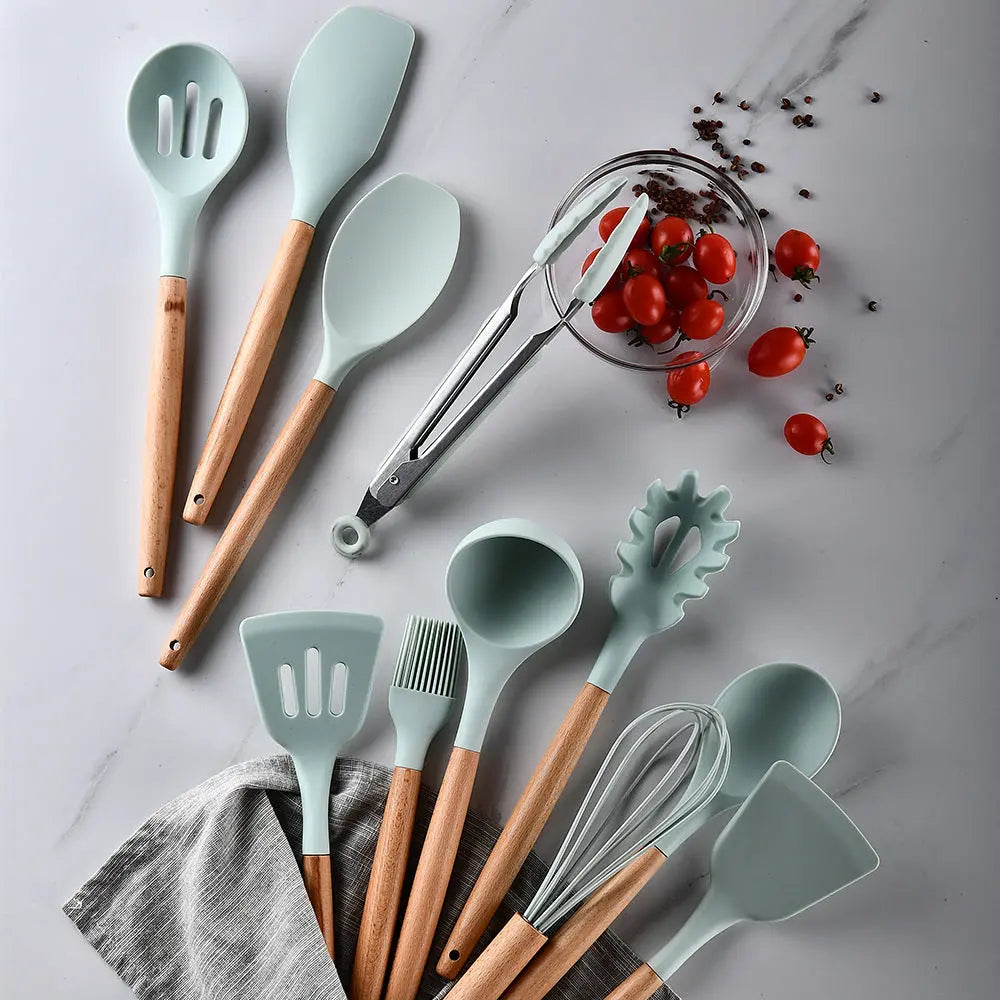 Close-up of the wood handle detail on the kitchen utensil set
