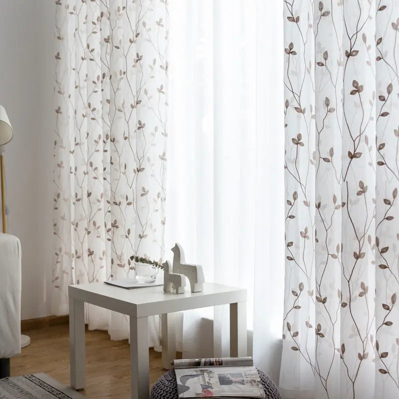 Pastoral embroidery gauze curtain in brown colorway styled in a room
