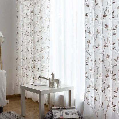 Pastoral embroidery gauze curtain in brown colorway styled in a room