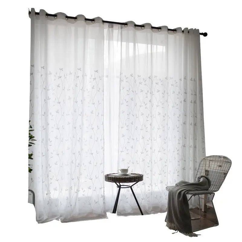Pastoral embroidery gauze curtain panel with natural light filtering through the window