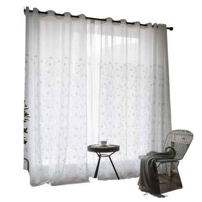 Pastoral embroidery gauze curtain panel with natural light filtering through the window