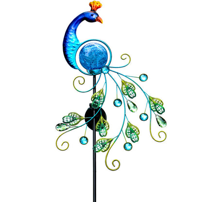 Close-up of the metal peacock design on the solar garden lamp