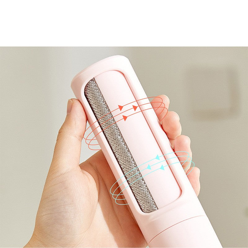 Pet hair remover brush demonstrating the self-cleaning swivel mechanism