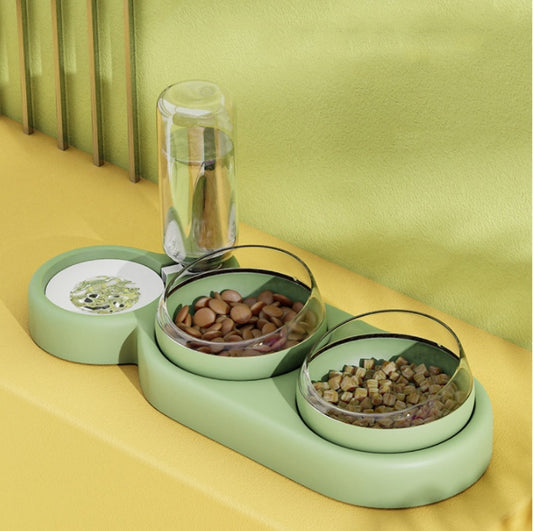 Pet double bowl water fountain feeder styled on a colorful backdrop with kibble