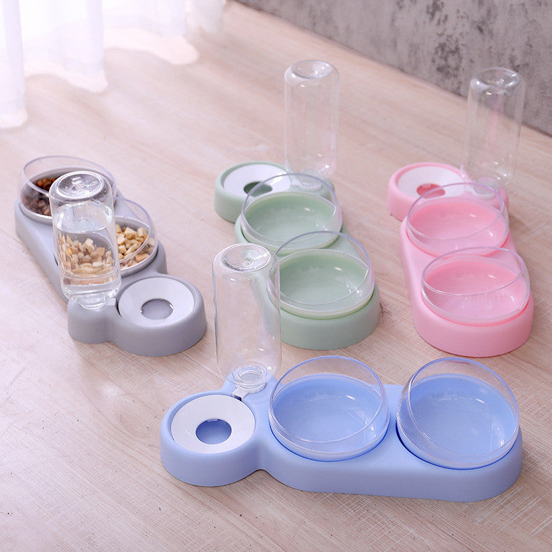 Pet double bowl with water fountain shown on a white background