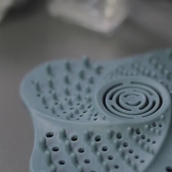 Demo video of the silicone drain hair catcher preventing clogs in a sink drain