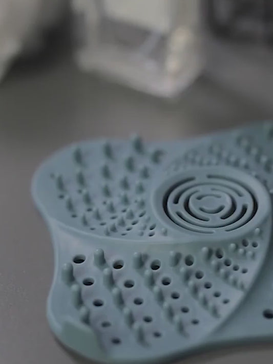 Demo video of the silicone drain hair catcher preventing clogs in a sink drain