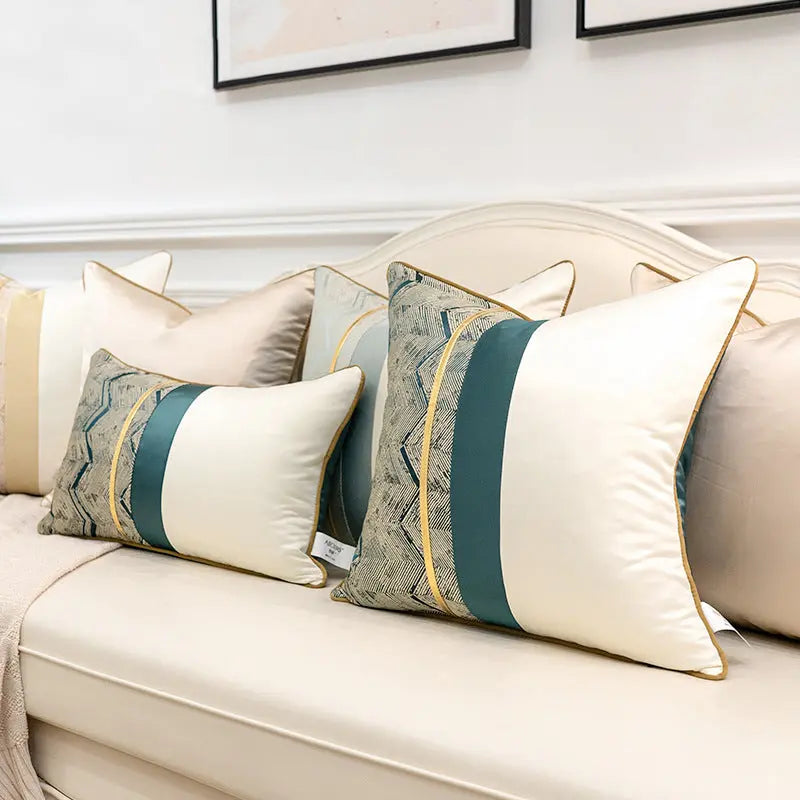 Pair of satin splicing cushion covers styled together on a sofa