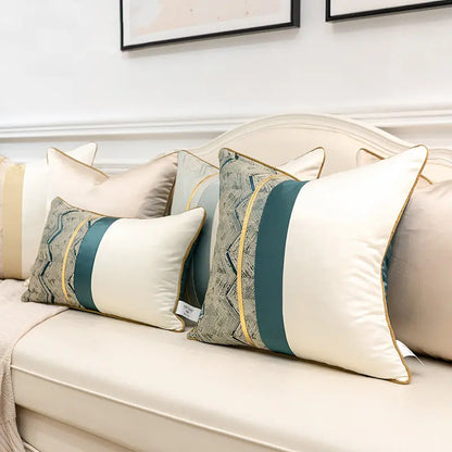 Pair of satin splicing cushion covers styled together on a sofa