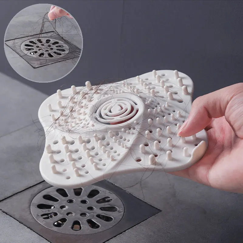 Silicone hair catcher lifted from a drain showing collected hair and clean result