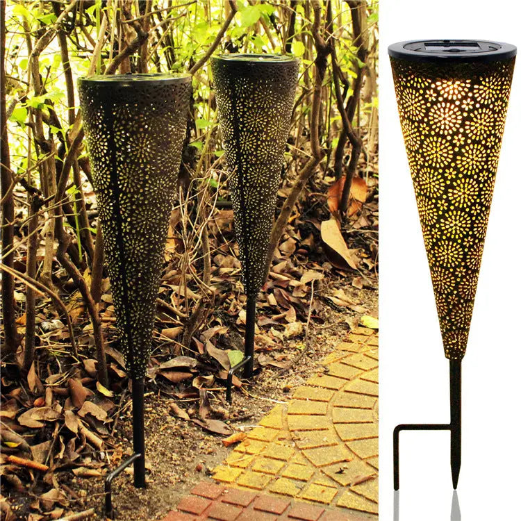 Solar garden projection light demonstrated on a patio at night