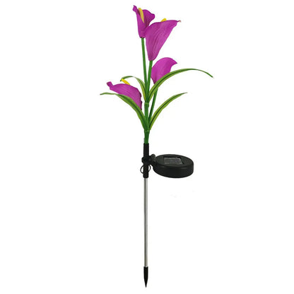 Solar lily garden stake light shown in daylight to display the flower design