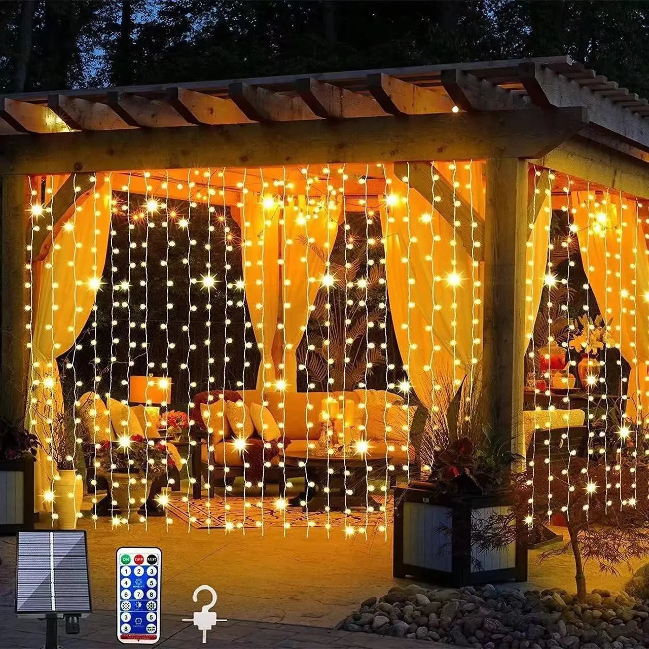 Copper wire curtain lights glowing warm white across an outdoor pergola patio at night