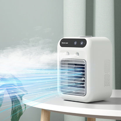 Portable USB air cooler fan releasing mist against a green curtain backdrop